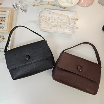LUNE Button Flap Cowhide Mini Bag