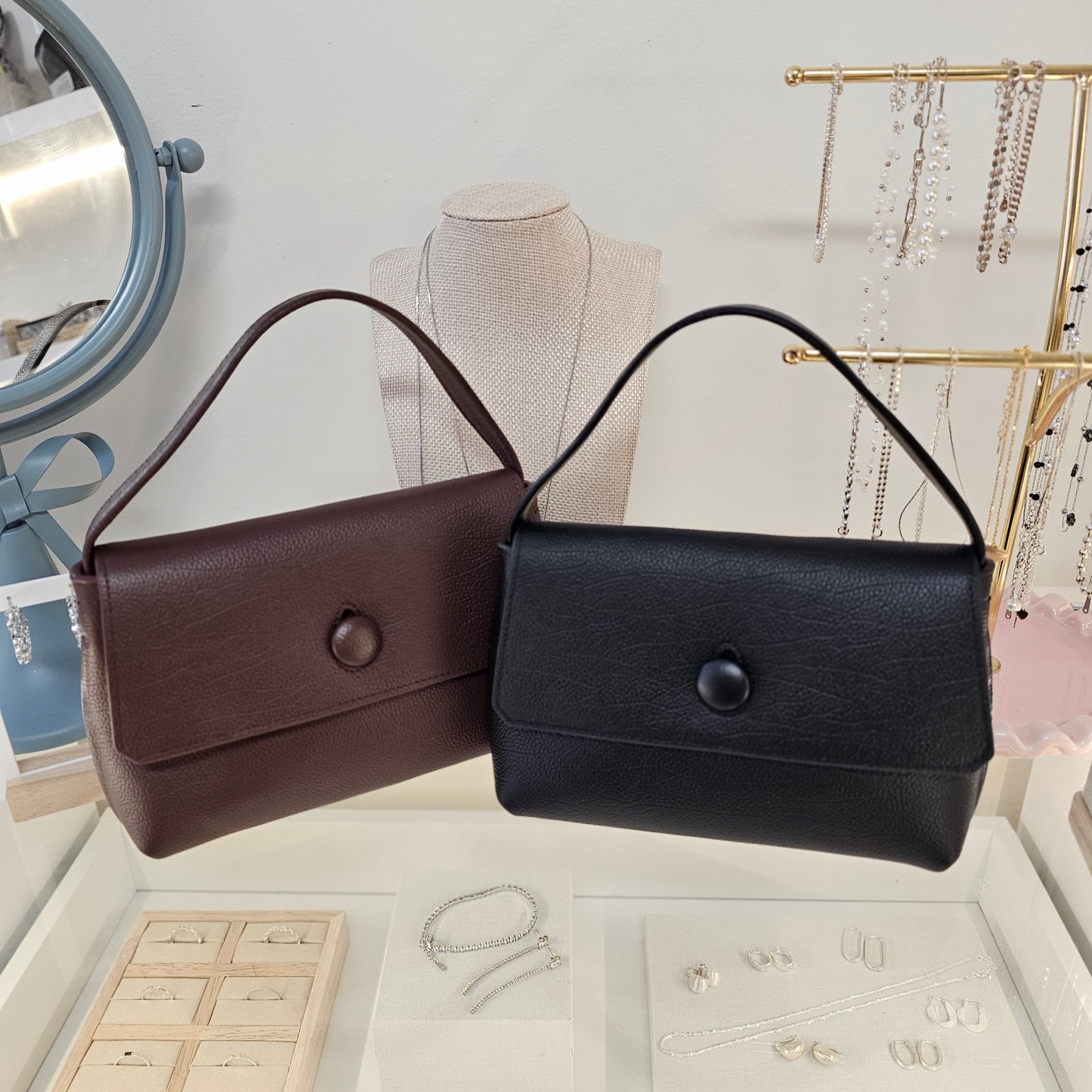 LUNE Button Flap Cowhide Mini Bag