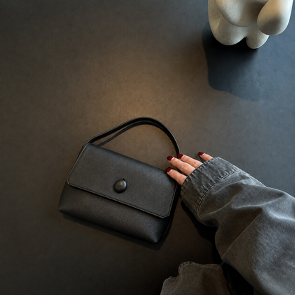 LUNE Button Flap Cowhide Mini Bag